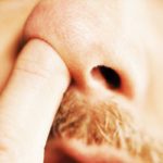 dream meaning pulling long booger out of nose