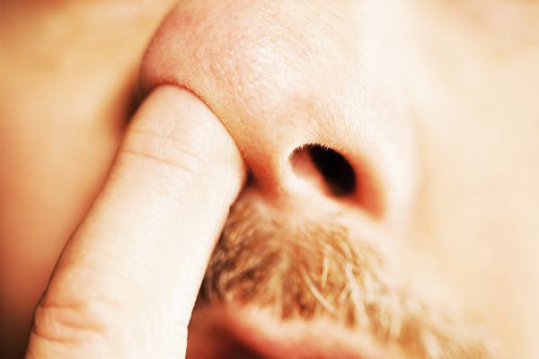 dream meaning pulling long booger out of nose